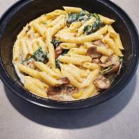 The Shroom Pasta · White sauce, roasted mushroom, garlic confit, spinach, parmesan, basil