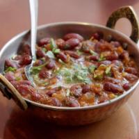 Punjabi Rajma · Red kidney beanand potato cooked in spices and gravy. Vegetarian.