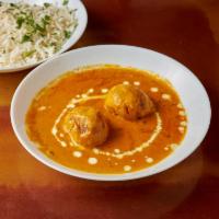 Malai Kofta · Croquettes of ground garden fresh vegetables and cottage cheese stuffed with nuts and raisin...