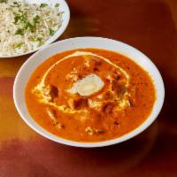 Butter Chicken · An authentic Punjabi dish consisting of tandoori prepared chicken, softly simmered in a smoo...