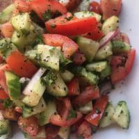 Armenian Salad · Ripe tomatoes, cucumbers, onions, and our own herbs and spices from Armenia.