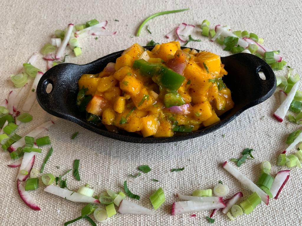 Mango Salad · Delicious fresh mango salad with red onions, red pepper, green pepper and coriander.