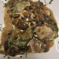 Veal Saltimbocca · Veal topped with prosciutto, spinach and mozzarella in Marsala sauce. Served with side salad...