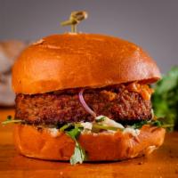  BEYOND BURGER · Beyond Burger, Onions , Tomatoes, Vegan Cheese, romaine lettuce, & Vegan Mayo on a Vegan Vil...