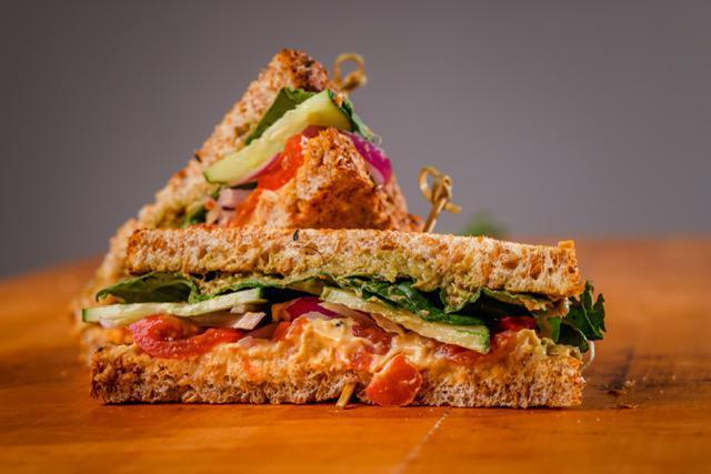 UPTOWN FRESCO  · Butterbean Gouda , Alfalfa, Avocado Hemp Mousse, Cucumbers and Onions on a  Sprouted Wheat Toast