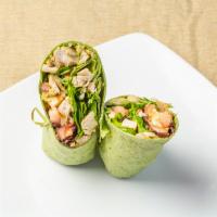 Spinach Grilled Chicken Wrap · Organic hormone free grilled chicken, tomatoes, avocado, arugula,  dressed in lime dark chil...