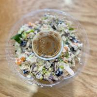 Tuna Salad  · White albacore tuna salad, made with romaine, cabbage, carrots, onions,
 dried cranberries, ...