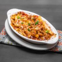 Swamp Fries · Cajun fries topped with crawfish etouffee and Monterey Jack cheese.