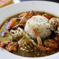 Seafood Gumbo · A Louisiana favorite to include shrimp, chicken, sausage, crab cooked in our famous roux ser...