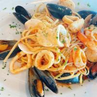 Seafood Pasta · spaghetti  with shrimp ,black mussels,clams,calamari.