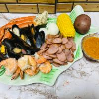 September ‘s Special  ·  1/2 lb snow crab legs , 1/2 lb shrimp head off,1/2 lb black mussel,1/2 lb sausage,2 eggs. C...