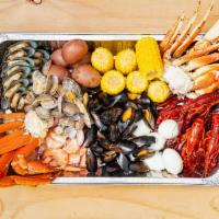 Family Party Platter · 1 lb snow crab leg, 1 lb dungeness crab, 1 lb shrimp (head off), 1 lb green mussel, 1 lb bla...