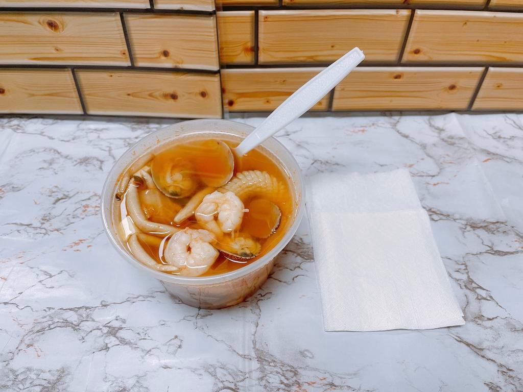 Kimchi Seafood Soup · spicy cabbage with shrimp,clam,tofu,calamari,mushroom