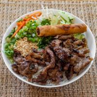 Vermicelli Salad with Grilled pork and Eggrolls · Served with fresh and pickled vegetables and herbs