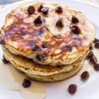 Chocolate Chip Pancakes · 3 rich, fluffy, chocolate chip pancakes with maple syrup and butter.
