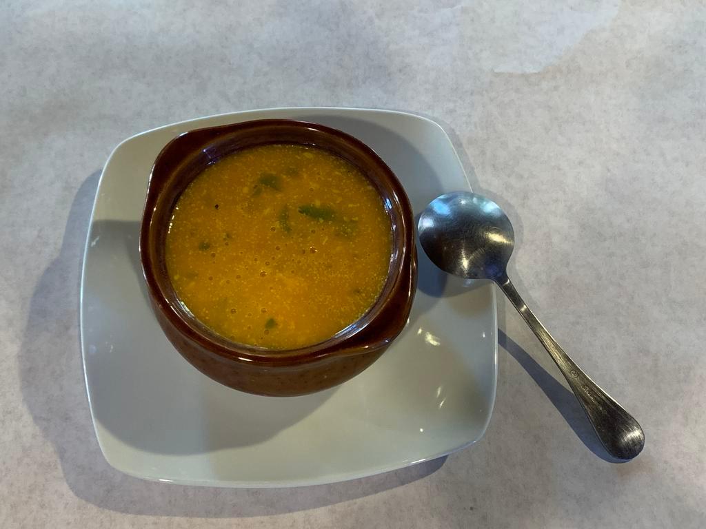 Mulligatawany Soup · A traditional soup made with yellow lentils and flavored with delicate herbs.