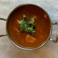 Chicken curry  · Traditional mughlai offering. Boneless chicken cooked in heavenly curry sauce,seasoned to yo...