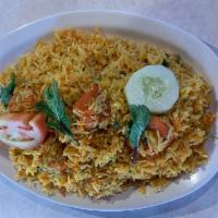 Chicken Tikka Biryani · Boneless BBQ chicken tikka cooked with basmati rice and traditional spices.