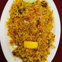 Lamb Biryani · Juicy boneless lamb cooked with basmati rice and traditional spices topped with cashews.