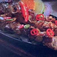 Lamb Boti Kebab · Tender chunks of lamb marinated in our house special sauce and cooked in the clay oven.