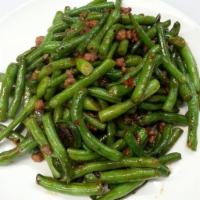 35. Dry Braised String Beans with Minced Pork · Lightly browned in fat and then cooked slowly in a closed pan with a small amount of liquid.