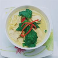 37. Green Curry · Green curry, coconut milk, eggplant, bamboo shoot, basil, and mixed bell pepper.
