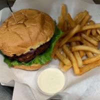 1/4 lb. Black Bean Burger · Chipotle black bean patty with Thousand Island, lettuce, tomatoes and onions on a toasted bun.
