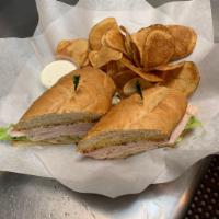 Turkey Sandwich · Thinly sliced turkey, Jack cheese, lettuce,  tomatoes, red onion and mayo on French roll