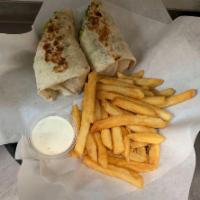 Chicken Bacon Ranch Wrap · Served with your choice of either grilled or crispy chicken, bacon, lettuce, tomatoes, shred...