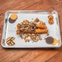 Cookie Crumble Churro  · Vanilla glaze and cookie crumble mix.