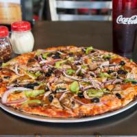 Marshall Stack Pizza · Pepperoni, sausage, green peppers, mushrooms, black olives and onions.