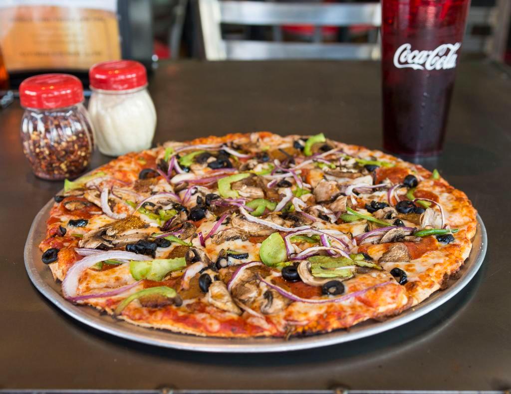 Marshall Stack Pizza · Pepperoni, sausage, green peppers, mushrooms, black olives and onions.