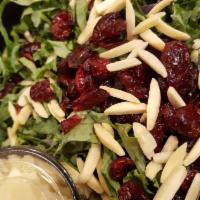 Kale Salad · Kale, cranberries, slivered almonds, coratina extra virgin olive oil, balsamic and shaved pa...