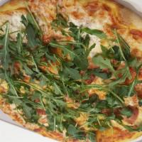 Primavera Pizza · Homemade red sauce, prosciutto crudo, whole milk mozzarella cheese and arugula.