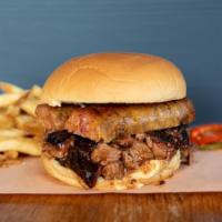 Texas BBQ Sandwich · Chopped brisket tossed in house sauce and topped with pork belly