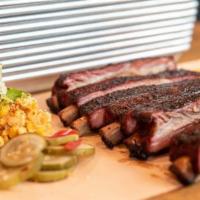 1/2 Rack St. Louis Ribs · 6 ribs with cornbread, house pickles and choice of side. 

Ribs Free From:

Dairy
Gluten
Soy