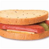 Polish Sandwich · A jumbo polish dog split and placed between 2 slices of warm rye bread, then topped with Swi...
