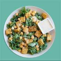 Kale Caesar · Shredded kale, parmesan cheese, chickpeas, diced tomatoes, cauliflower croutons, vegan caesa...