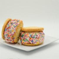 Happy Face Sandwich 2-Pack · Sugar Cookies, Vanilla Ice Cream, Rolled In Rainbow Sprinkles.  Brings two ice cream sandwic...