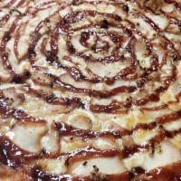 Texas Pizza · BBQ sauce, chicken, and garlic.