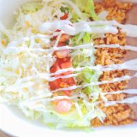 Veggie Burrito Bowl · Served with Beans, Rice, Cheese, Lettuce, Tomato and Sour Cream
