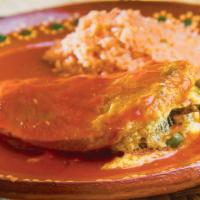 Chile Relleno Dinner · Includes 2 stuffed peppers.  Served with Rice and Beans