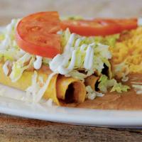 Chicken Flauta Dinner · 3 Chicken Flautas Served with Lettuce, Tomato, Cheese and Sour Cream. Rice and Beans.
