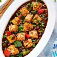 Chilli Paneer	 · Fried crispy paneer cubes tossed in a spicy sauce.