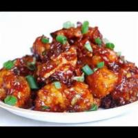 Idly Manchurian · Idly dumplings diced and dipped in spicy batter and simmered in a sweet and sour sauce.