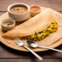Masala Dosa · South Indian most favorite dosa. Served with chutney and sambar with sauteed potato filling.