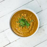 Organic Smoky Split Pea Soup · A hearty vegetarian split pea soup with chunks of carrots and tomatoes and a hint of smoke f...