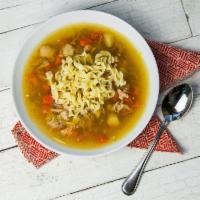 Grandma Mary’s Chicken Soup · A flavorful soothing broth full of chicken, noodles, carrots, parsnips and dill. Served with...