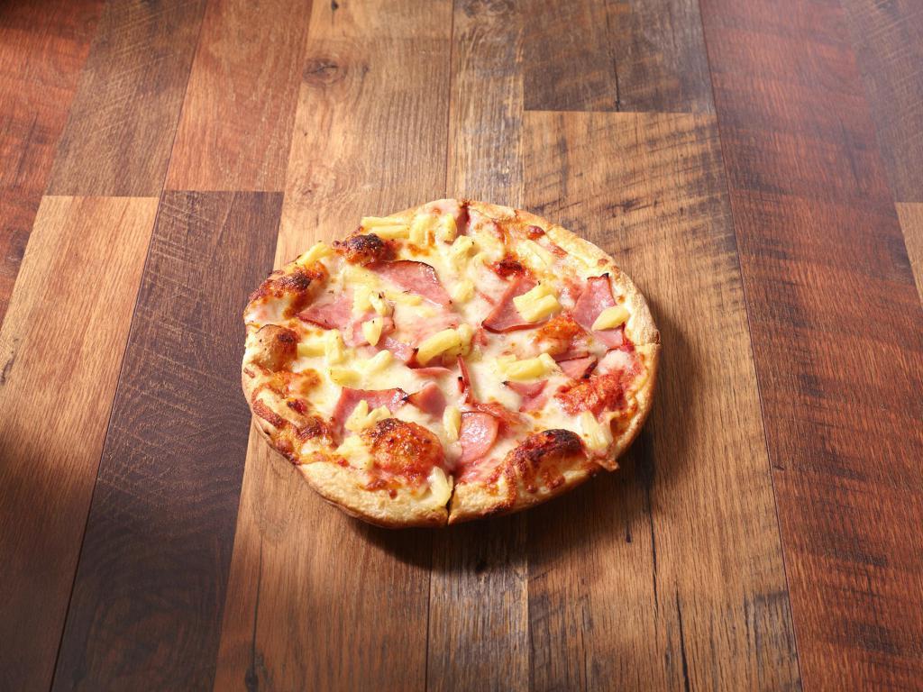 Hawaiian Pizza · Ham and pineapple. Includes extra cheese.