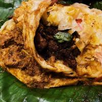 Pothi Porotta (Beef/Chicken). · The spicy beef/Chicken and the flaky porotta are truly a match made in culinary heaven. Here...